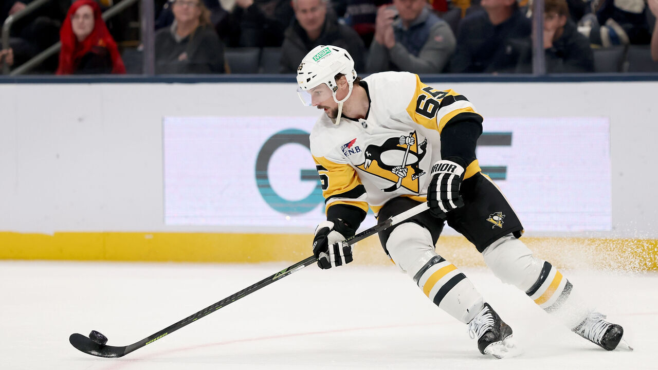COLUMBUS, OHIO - JANUARY 4: Erik Karlsson #65 of the Pittsburgh Penguins controls the puck during the game against the Pittsburgh Penguins at Nationwide Arena on January 4, 2026 in Columbus, Ohio. Pittsburgh defeated Columbus 5-4 in overtime.