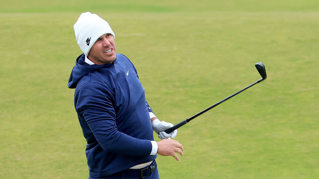 ST ANDREWS, SCOTLAND - OCTOBER 04: Brooks Koepka of The United States plays his second shot on the ninth hole during the completion of the weather delayed second round at Kingsbarns Golf Club on day three of the Alfred Dunhill Links Championship 2025 at Kingsbarns on October 04, 2025 in St Andrews, Scotland.