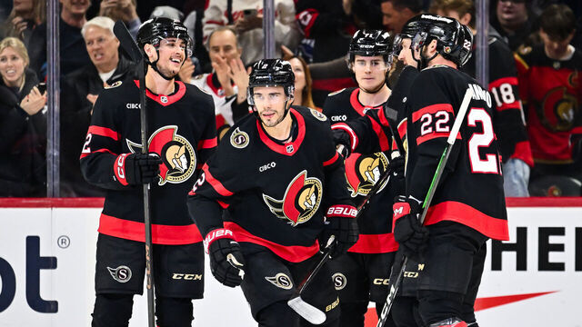 OTTAWA, CANADA - JANUARY 13: Artem Zub #2 of the Ottawa Senators celebrates his goal with teammates during the first period against the Vancouver Canucks at Canadian Tire Centre on January 13, 2026 in Ottawa, Ontario, Canada.
