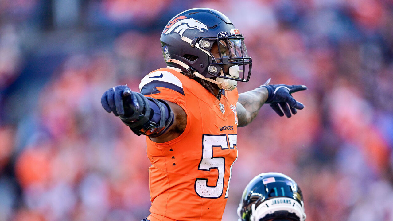 DENVER, CO - DECEMBER 21: Denver Broncos linebacker Dre Greenlaw (57) celebrates a pass defended against Jacksonville Jaguars wide receiver Parker Washington (11) during a game at Empower Field at Mile High on December 21, 2025 in Denver, Colorado.