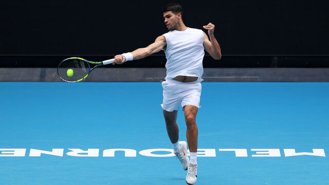 MELBOURNE, AUSTRALIA - JANUARY 14: Carlos Alcaraz of Spain plays a forehand during a practice session ahead of the 2026 Australian Open at Melbourne Park on January 14, 2026 in Melbourne, Australia.