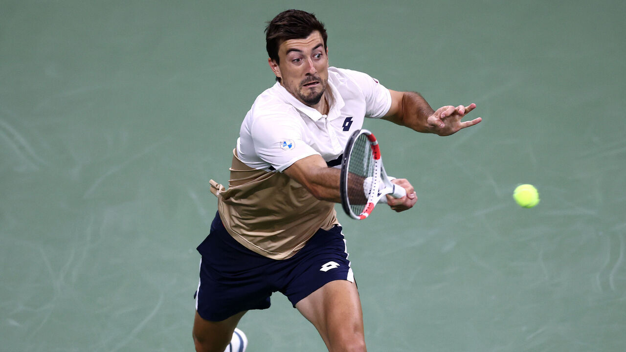 NEW YORK, NEW YORK - AUGUST 25: Sebastian Ofner of Austria returns a shot against Casper Ruud of Norway during their Men's Singles First Round match on Day Two of the 2025 US Open at USTA Billie Jean King National Tennis Center on August 25, 2025 in the Flushing neighborhood of the Queens borough of New York City.