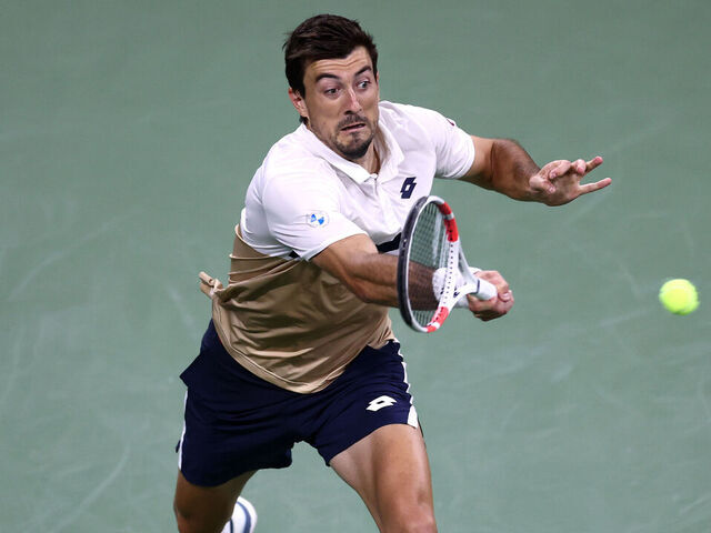 NEW YORK, NEW YORK - AUGUST 25: Sebastian Ofner of Austria returns a shot against Casper Ruud of Norway during their Men's Singles First Round match on Day Two of the 2025 US Open at USTA Billie Jean King National Tennis Center on August 25, 2025 in the Flushing neighborhood of the Queens borough of New York City.