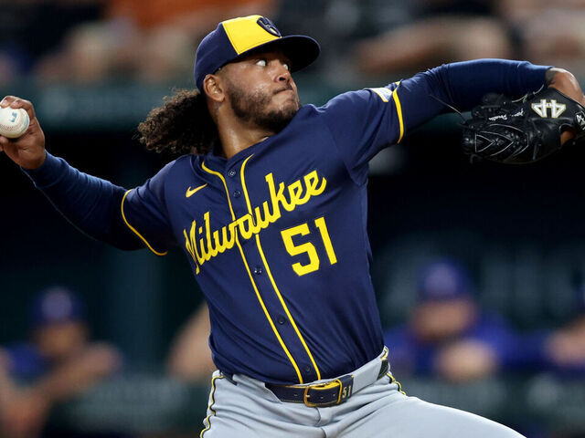 ARLINGTON, TEXAS - SEPTEMBER 10: Freddy Peralta #51 of the Milwaukee Brewers throws a pitch during the second inning against the Texas Rangers at Globe Life Field on September 10, 2025 in Arlington, Texas.