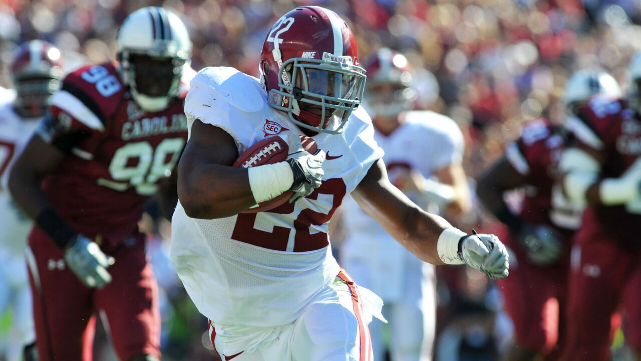 COLUMBIA, SC - OCTOBER 9: Running back Mark Ingram #22 of the Alabama Crimson Tide rushes upfield against the South Carolina Gamecocks October 9, 2010 at Williams-Brice Stadium in Columbia, South Carolina.