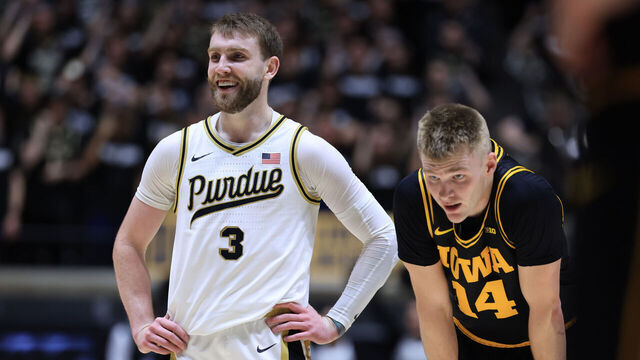 WEST LAFAYETTE, INDIANA - JANUARY 14: Braden Smith #3 of the Purdue Boilermakers reacts with Bennett Stirtz #14 of the Iowa Hawkeyes during the second half at Mackey Arena on January 14, 2026 in West Lafayette, Indiana.