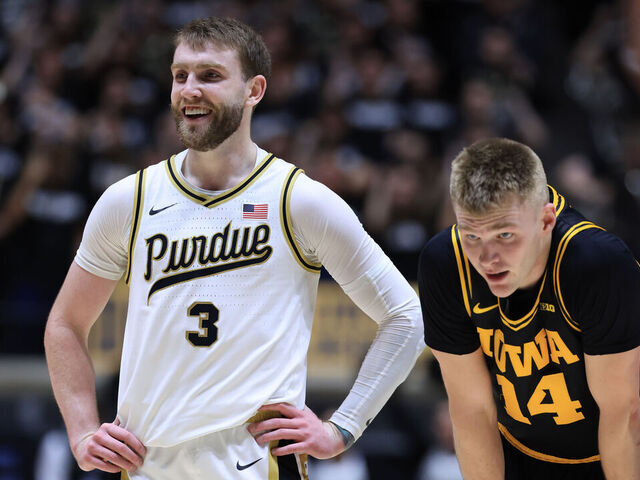 WEST LAFAYETTE, INDIANA - JANUARY 14: Braden Smith #3 of the Purdue Boilermakers reacts with Bennett Stirtz #14 of the Iowa Hawkeyes during the second half at Mackey Arena on January 14, 2026 in West Lafayette, Indiana.