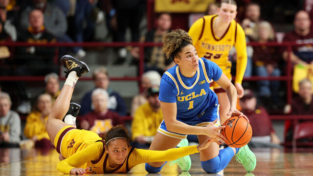 MINNEAPOLIS, MINNESOTA - JANUARY 14: Kiki Rice #1 of the UCLA Bruins steals the ball from Amaya Battle #3 of the Minnesota Golden Gophers in the third quarter at Williams Arena on January 14, 2026 in Minneapolis, Minnesota. The Bruins defeated the Golden Gophers 76-58.