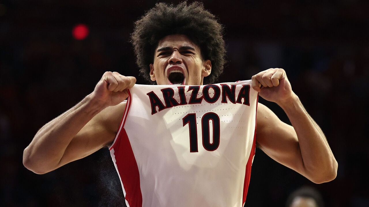 TUCSON, ARIZONA - JANUARY 14: Koa Peat #10 of the Arizona Wildcats celebrates after scoring against the Arizona State Sun Devils during the second half of the NCAAB game at McKale Center on January 14, 2026 in Tucson, Arizona. The Wildcats defeated the Sun Devils 89-82.