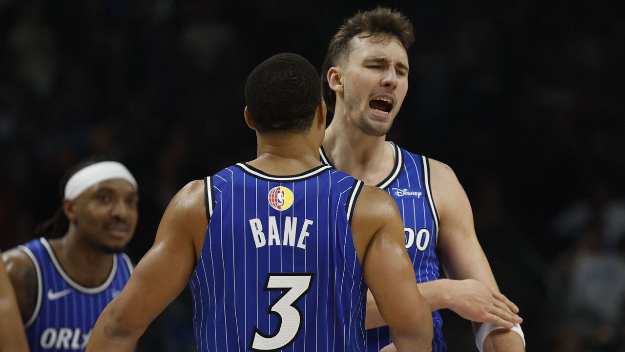 Orlando Magic's German small forward #22 Franz Wagner (R) and Orlando Magic's US shooting guard #03 Desmond Bane celebrate during the 2025/2026 NBA season basketball match between Memphis Grizzlies and Orlando Magic on January 15, 2026 in Berlin.