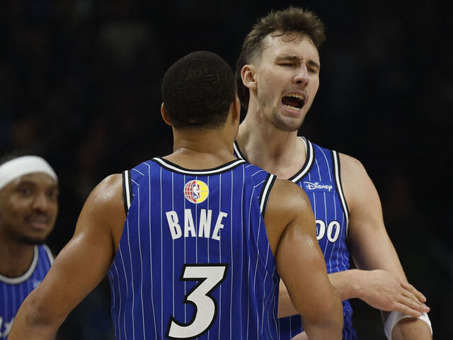 Orlando Magic's German small forward #22 Franz Wagner (R) and Orlando Magic's US shooting guard #03 Desmond Bane celebrate during the 2025/2026 NBA season basketball match between Memphis Grizzlies and Orlando Magic on January 15, 2026 in Berlin.