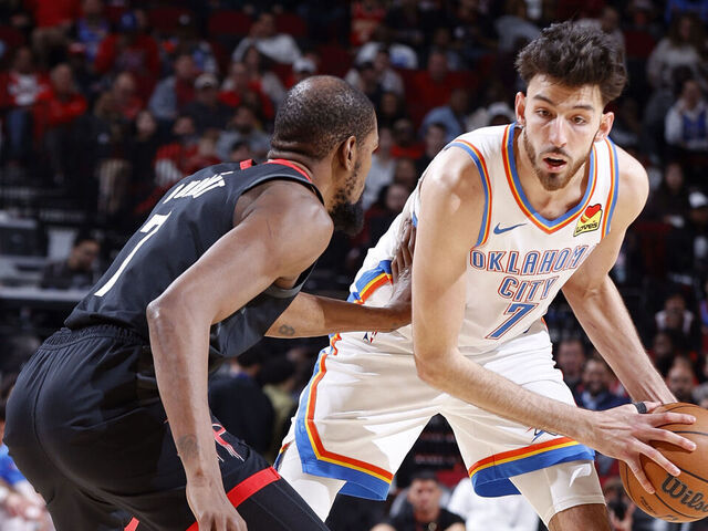 HOUSTON, TX - JANUARY 15: Chet Holmgren #7 of the Oklahoma City Thunder handles the ball while defended by Kevin Durant #7 of the Houston Rockets during the game on January 15, 2026 at the Toyota Center in Houston, Texas. Mandatory Copyright Notice: Copyright 2026 NBAE