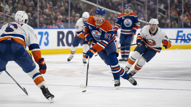EDMONTON, ALBERTA - JANUARY 15: Edmonton Oilers center Connor McDavid (97) skates with the puck against the New York Islanders during the third period at Rogers Place on January 15, 2026 in Edmonton, Alberta, Canada.