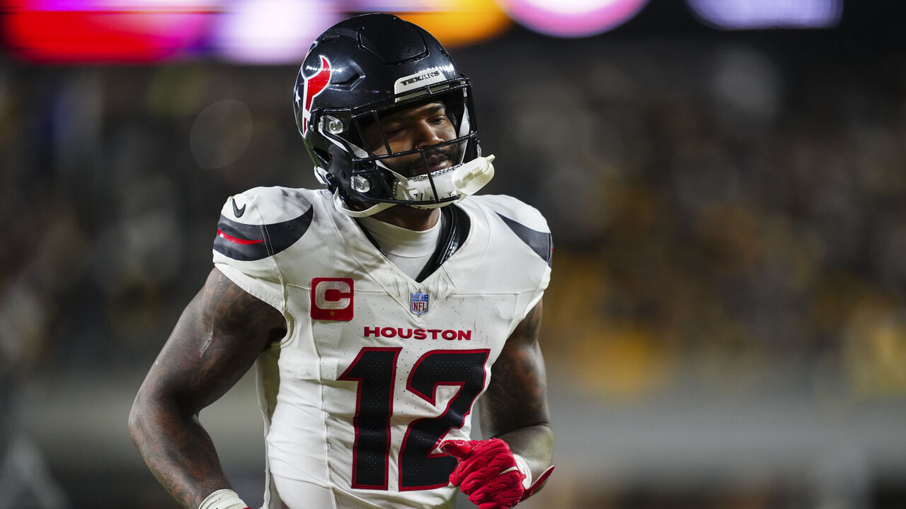 PITTSBURGH, PA - JANUARY 12: Nico Collins #12 of the Houston Texans exits the field during an NFL wild card playoff football game against the Pittsburgh Steelers at Acrisure Stadium on January 12, 2026 in Pittsburgh, Pennsylvania.