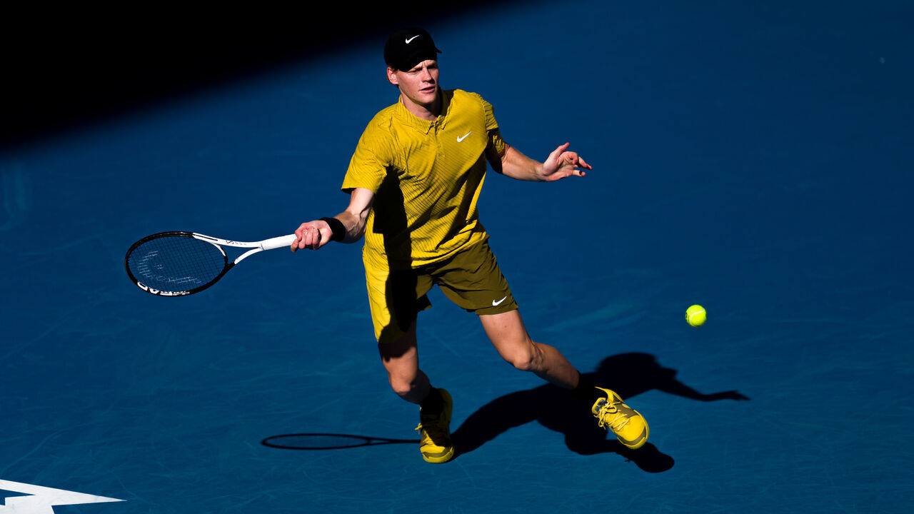 MELBOURNE, AUSTRALIA - JANUARY 16: Jannik Sinner of Italy plays a forehand against Felix Auger Aliassime of Canada in the opening week showdown match ahead of the 2026 Australian Open at Melbourne Park on January 16, 2026 in Melbourne, Australia.