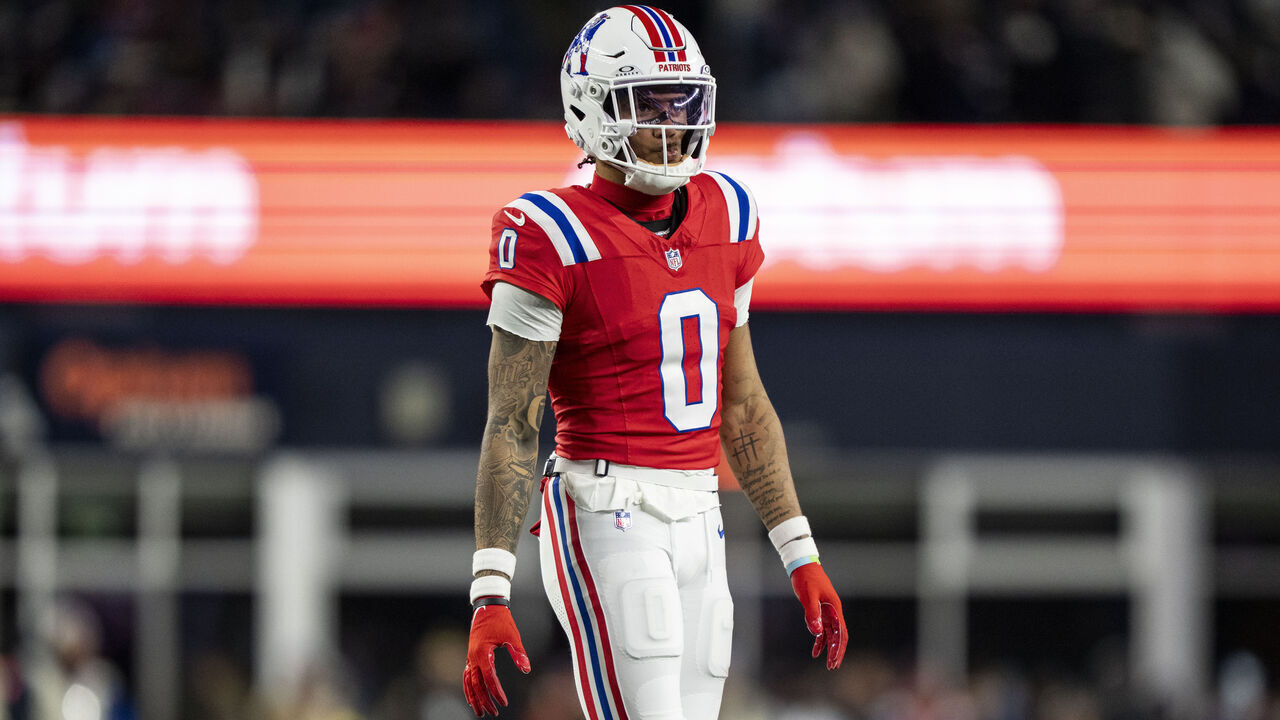FOXBOROUGH, MASSACHUSETTS - DECEMBER 1: Christian Gonzalez #0 of the New England Patriots looks on during an NFL football game against the New York Giants at Gillette Stadium on December 01, 2025 in Foxborough, Massachusetts.