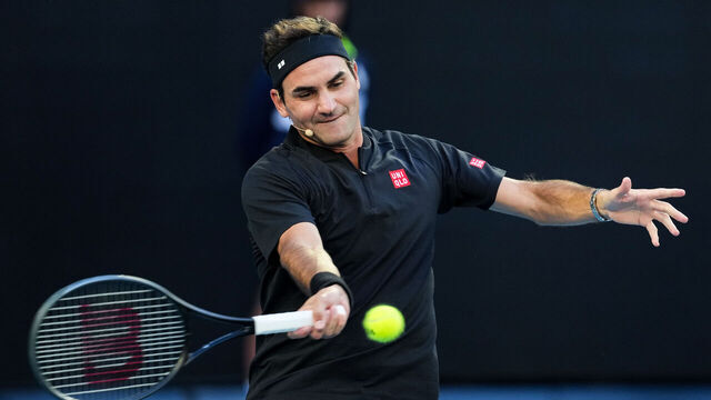 MELBOURNE, AUSTRALIA - JANUARY 17: Roger Federer of Switzerland returns a shot during the Opening Ceremony exhibition match ahead of the 2026 Australian Open at Melbourne Park on January 17, 2026 in Melbourne, Australia.