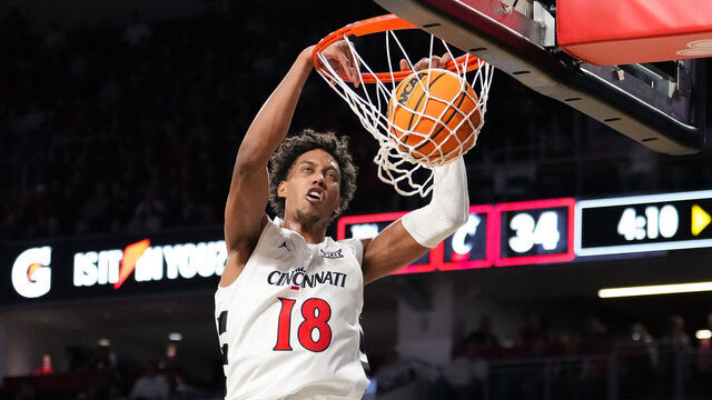 CINCINNATI, OHIO - JANUARY 14: Baba Miller #18 of the Cincinnati Bearcats dunks the ball in the first half against the Colorado Buffaloes at Fifth Third Arena on January 14, 2026 in Cincinnati, Ohio.