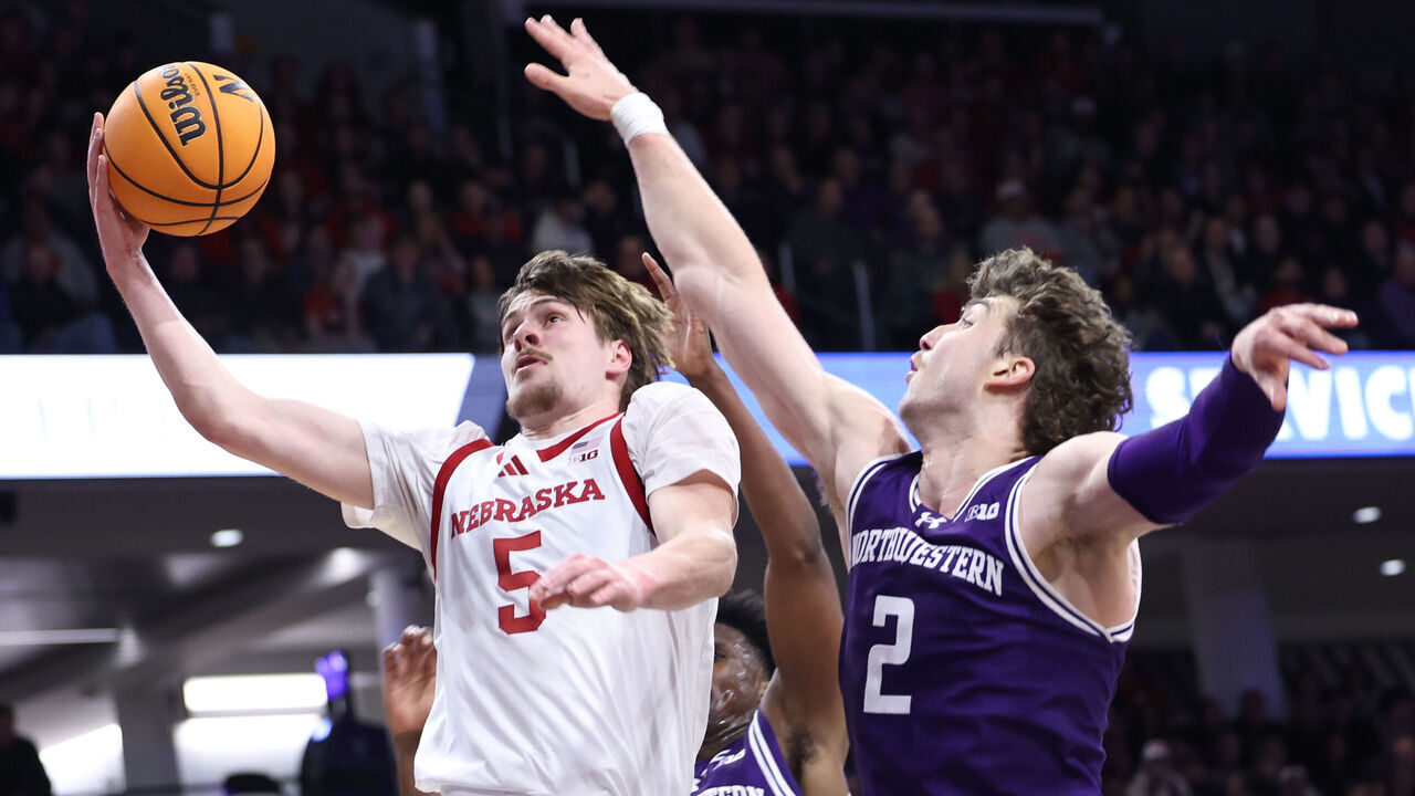 EVANSTON, ILLINOIS - JANUARY 17: Braden Frager #5 of the Nebraska Cornhuskers shoots past Nick Martinelli #2 of the Northwestern Wildcats during the first half at Welsh-Ryan Arena on January 17, 2026 in Evanston, Illinois.