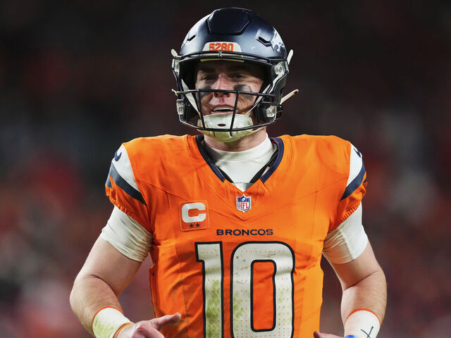 DENVER, CO - JANUARY 17: Bo Nix #10 of the Denver Broncos celebrates after scoring a touchdown against the Buffalo Bills during the second half of an AFC Divisional Playoff game at Empower Field At Mile High on January 17, 2026 in Denver, Colorado.