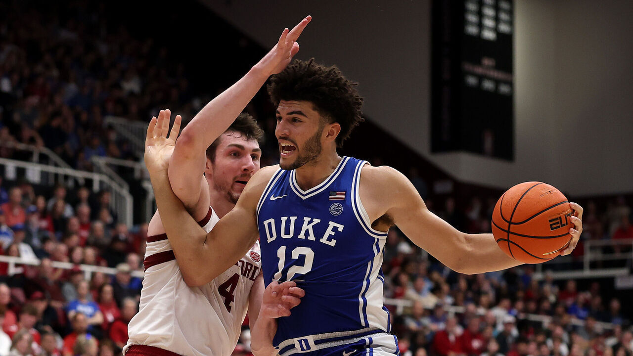 PALO ALTO, CALIFORNIA - JANUARY 17: Cameron Boozer #12 of the Duke Blue Devils is guarded by AJ Rohosy #4 of the Stanford Cardinal during the second half at Stanford Maples Pavilion on January 17, 2026 in Palo Alto, California.