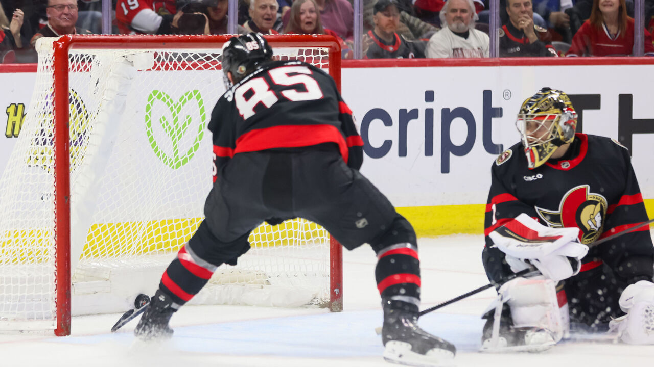 OTTAWA, ON - JANUARY 17: The game winning overtime goal by Cole Caufield #13 of the Montreal Canadiens [NOT PICTURED] in the back of the net as Jake Sanderson #85 of the Ottawa Senators and Leevi Merilainen #1 look on on January 17, 2026, at Canadian Tire Centre in Ottawa, ON, Canada.