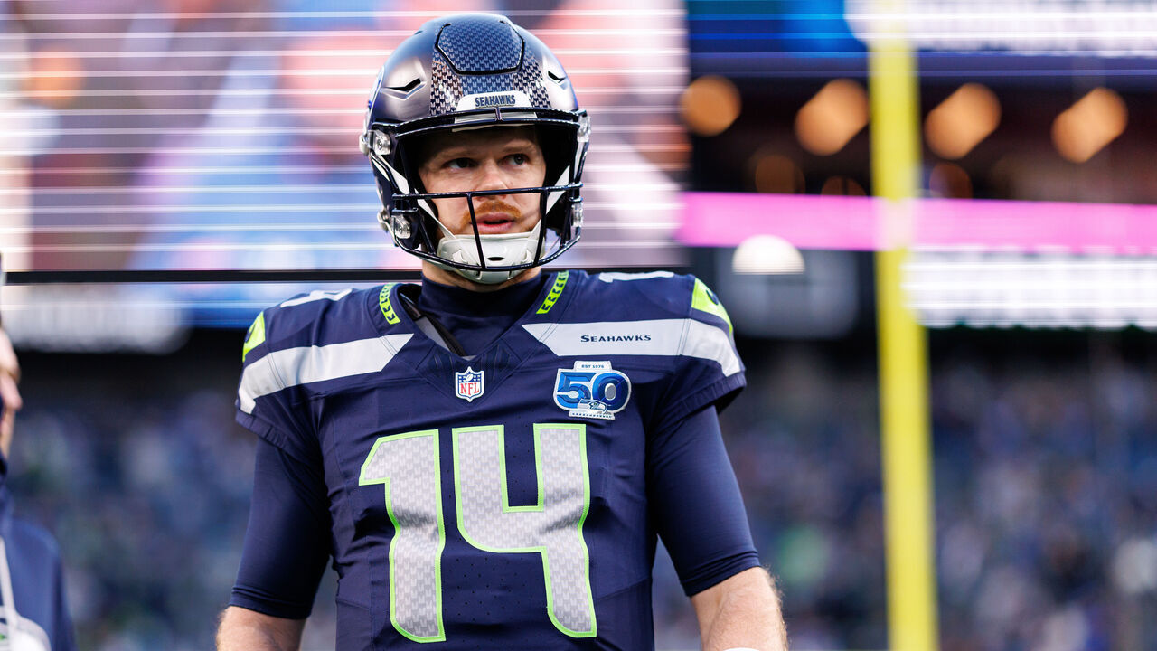 SEATTLE, WASHINGTON - JANUARY 17: Sam Darnold #14 of the Seattle Seahawks stands on the field during an NFL divisional playoff football game against the San Francisco 49ers at Lumen Field on January 17, 2026 in Seattle, Washington.