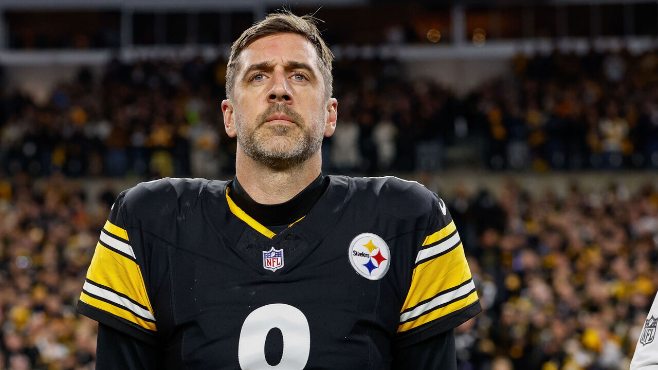 PITTSBURGH, PENNSYLVANIA - JANUARY 12: Aaron Rodgers #8 of the Pittsburgh Steelers stands for the national anthem prior to the AFC Wild Card playoff game against the Houston Texans at Acrisure Stadium on January 12, 2026 in Pittsburgh, Pennsylvania.