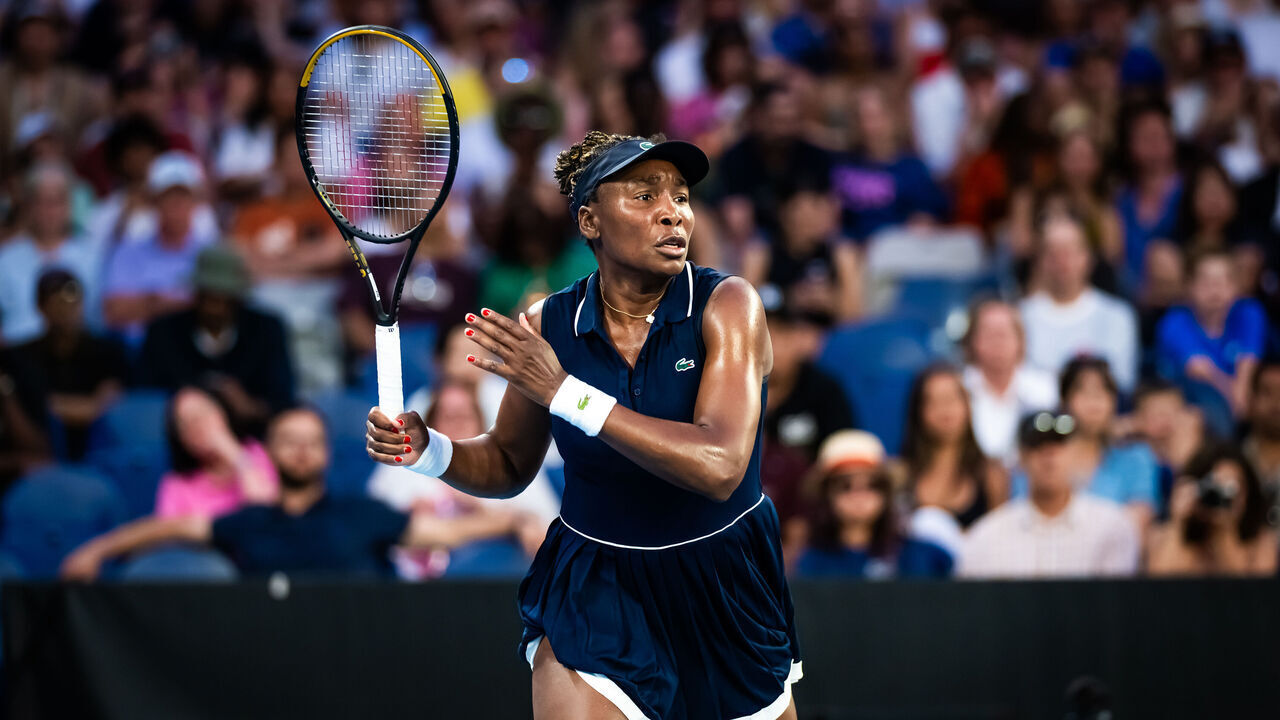 MELBOURNE, AUSTRALIA - JANUARY 18: Venus Williams of the United States in action against Olga Danilovic of Serbia in the first round on Day 1 of the 2026 Australian Open at Melbourne Park on January 18, 2026 in Melbourne, Australia