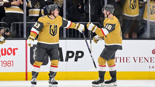LAS VEGAS, NEVADA - JANUARY 17: Mitch Marner #93 and Pavel Dorofeyev #16 of the Vegas Golden Knights celebrate after Marner scored a third-period goal against the Nashville Predators during their game at T-Mobile Arena on January 17, 2026 in Las Vegas, Nevada. The Golden Knights defeated the Predators 7-2.