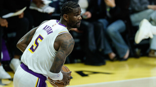 LOS ANGELES, CA - JANUARY 18: Los Angeles Lakers center Deandre Ayton (5) grabs a rebound during the Toronto Raptors vs Los Angeles Lakers NBA game on January 18, 2026, at Crypto.com Arena in Los Angeles, CA.