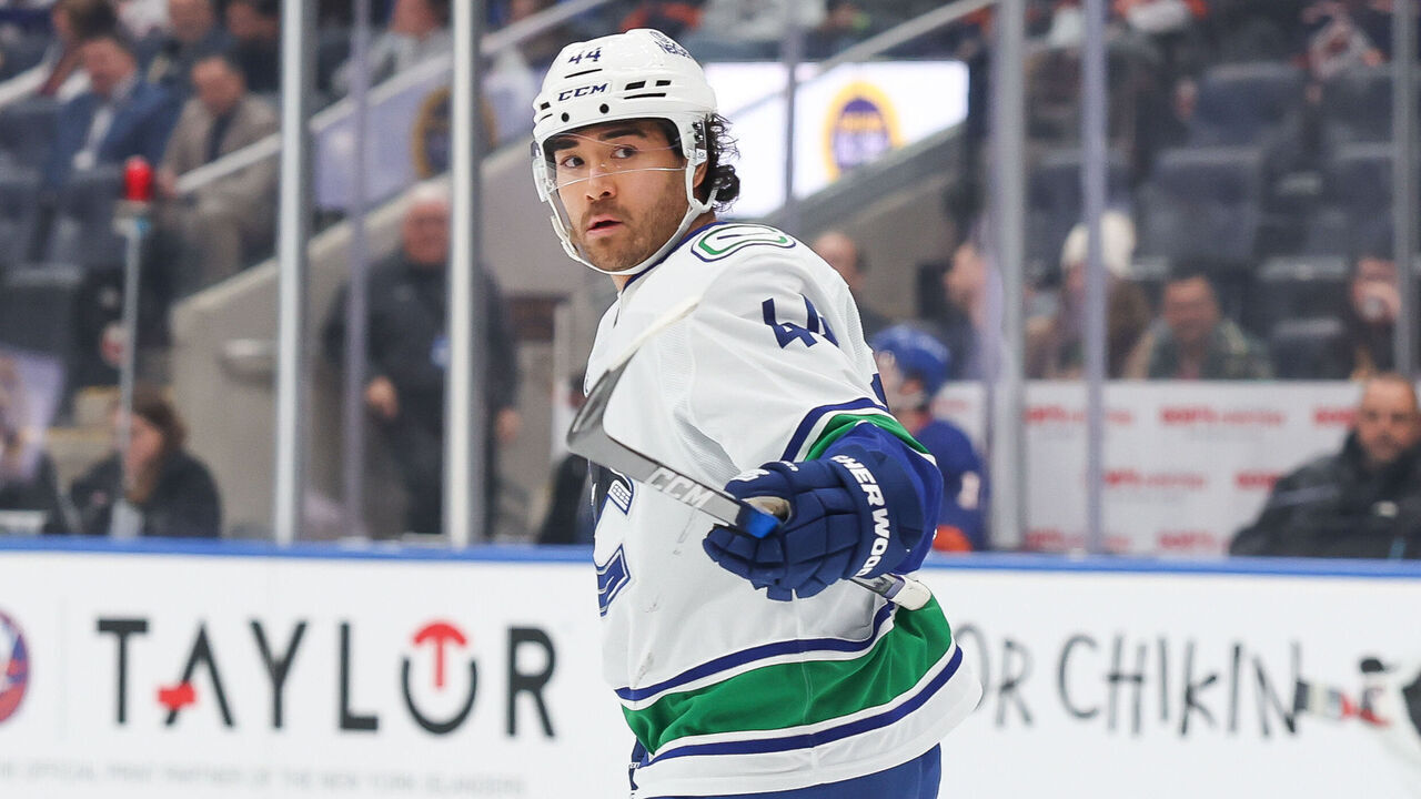 ELMONT, NEW YORK - DECEMBER 19: Kiefer Sherwood #44 of the Vancouver Canucks celebrates after scoring a goal during the first period of an NHL game against the New York Islanders at UBS Arena on December 19, 2025 in Elmont, New York.