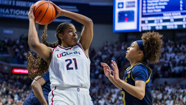 STORRS, CONNECTICUT - JANUARY 19: Sarah Strong #21 of the Connecticut Huskies gets the rebound against Hannah Hidalgo #3 of the Notre Dame Fighting Irish during the first half of the NCAA women's basketball game at Harry A. Gampel Pavilion on January 19, 2026 in Storrs, Connecticut.