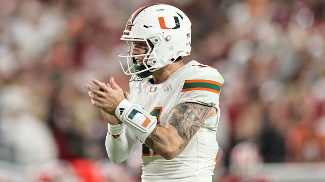 MIAMI GARDENS, FLORIDA - JANUARY 19: Carson Beck #11 celebrates as Mark Fletcher Jr. #4 of the Miami Hurricanes scores a third quarter touchdown against the Indiana Hoosiers in the 2026 College Football Playoff National Championship at Hard Rock Stadium on January 19, 2026 in Miami Gardens, Florida.