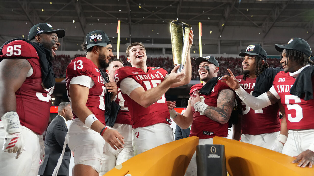 MIAMI GARDENS, FL - JANUARY 19: QB Fernando Mendoza #15 of the Indiana Hoosiers lifts the National Champsionship trophy following the Indiana Hoosiers versus the Miami Hurricanes College Football Playoff National Championship Game Presented by AT&T on January 19, 2026, at Hard Rock Stadium in Miami Gardens, FL.