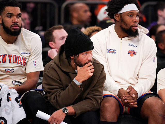NEW YORK, NEW YORK - JANUARY 17: Jalen Brunson #11 of the New York Knicks watches the game from the bench in the second half during the game against the Phoenix Suns at Madison Square Garden on January 17, 2026 in New York City.