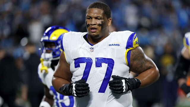 CHARLOTTE, NC - JANUARY 10: Los Angeles Rams offensive tackle Alaric Jackson (77) looks on during the NFC Wildcard playoff game against the Carolina Panthers on January 10, 2026 at Bank of America Stadium in Charlotte, North Carolina.