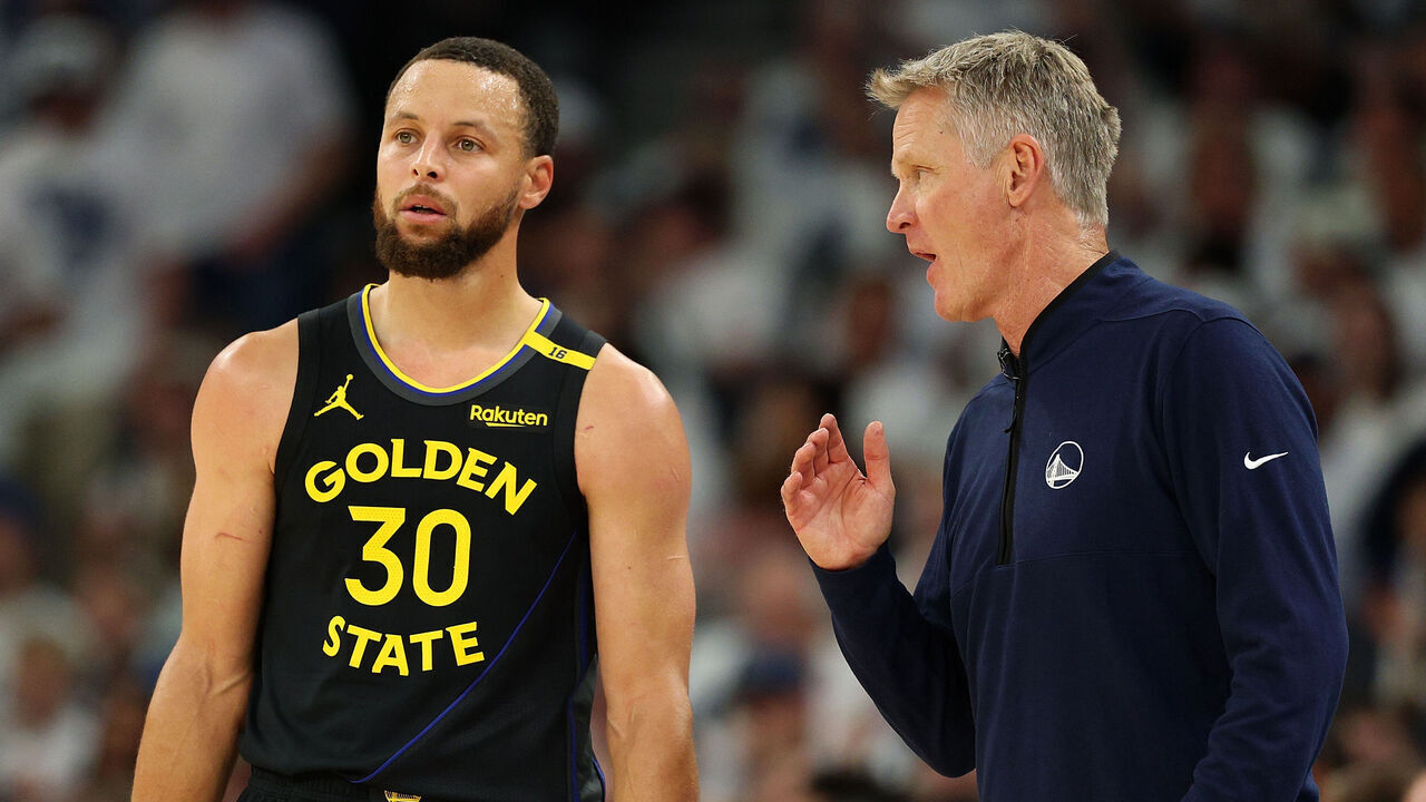 MINNEAPOLIS, MINNESOTA - MAY 06: Head coach Steve Kerr talks to Stephen Curry #30 of the Golden State Warriors in the second quarter of Game One against the Minnesota Timberwolves during the Second Round of the 2025 NBA Playoffs at Target Center on May 06, 2025 in Minneapolis, Minnesota. The Warriors defeated the Timberwolves 99-88 to take a 1-0 series lead.