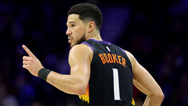 PHILADELPHIA, PENNSYLVANIA - JANUARY 20: Devin Booker #1 of the Phoenix Suns celebrates a three-pointer during the second half against the Philadelphia 76ers at Xfinity Mobile Arena on January 20, 2026 in Philadelphia, Pennsylvania.