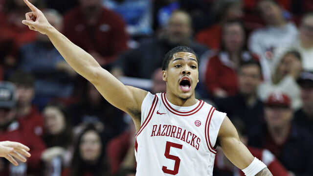 FAYETTEVILLE, ARKANSAS - JANUARY 20: Darius Acuff Jr. #5 of the Arkansas Razorbacks yells to the bench in the first half during the game against the Vanderbilt Commodores at Bud Walton Arena on January 20, 2026 in Fayetteville, Arkansas.