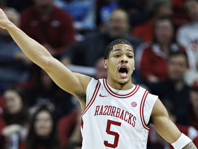 FAYETTEVILLE, ARKANSAS - JANUARY 20: Darius Acuff Jr. #5 of the Arkansas Razorbacks yells to the bench in the first half during the game against the Vanderbilt Commodores at Bud Walton Arena on January 20, 2026 in Fayetteville, Arkansas.
