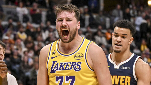 DENVER , CO - JANUARY 20: Luka Doncic (77) of the Los Angeles Lakers screams for an and-one call after making a shot during the third quarter against the Denver Nuggets at Ball Arena in Denver, Colorado on Tuesday, January 20, 2026.
