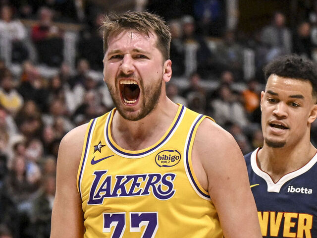 DENVER , CO - JANUARY 20: Luka Doncic (77) of the Los Angeles Lakers screams for an and-one call after making a shot during the third quarter against the Denver Nuggets at Ball Arena in Denver, Colorado on Tuesday, January 20, 2026.