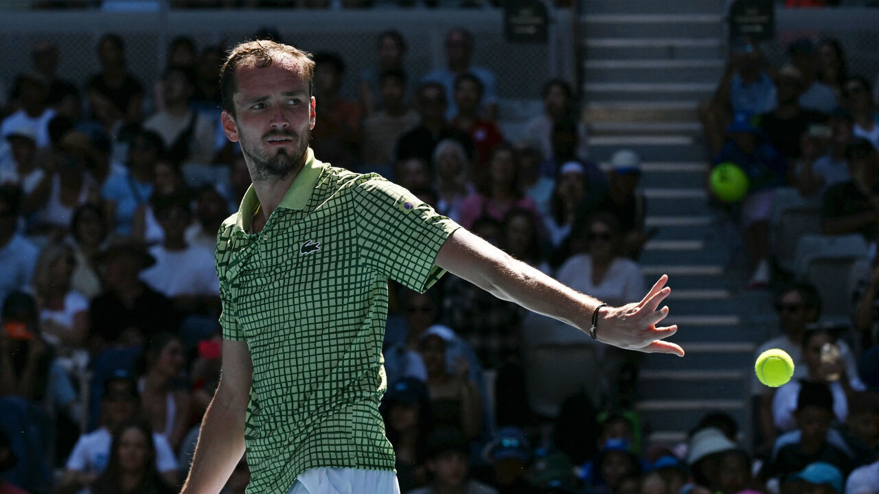 Russia's Daniil Medvedev reacts after his victory against France's Quentin Halys during their men's singles match on day four of the Australian Open tennis tournament in Melbourne on January 21, 2026. / -- IMAGE RESTRICTED TO EDITORIAL USE - STRICTLY NO COMMERCIAL USE --