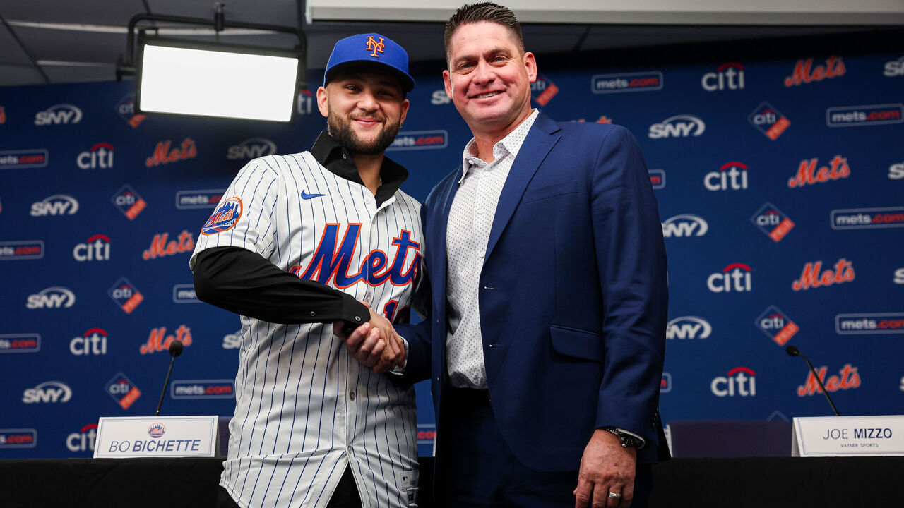 NEW YORK, NEW YORK - JANUARY 21: Bo Bichette #19 and Carlos Mendoza of the New York Mets pose for a photo during an introductory press conference after signing a contract with the New York Mets at Citi Field on January 21, 2026 in the Queens borough of New York City.