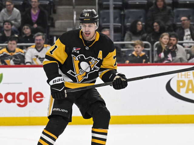 PITTSBURGH, PA - JANUARY 13: Pittsburgh Penguins center Evgeni Malkin (71) skates during the overtime period in the NHL game between the Pittsburgh Penguins and the Tampa Bay Lightning on January 13, 2026, at PPG Paints Arena in Pittsburgh, PA.