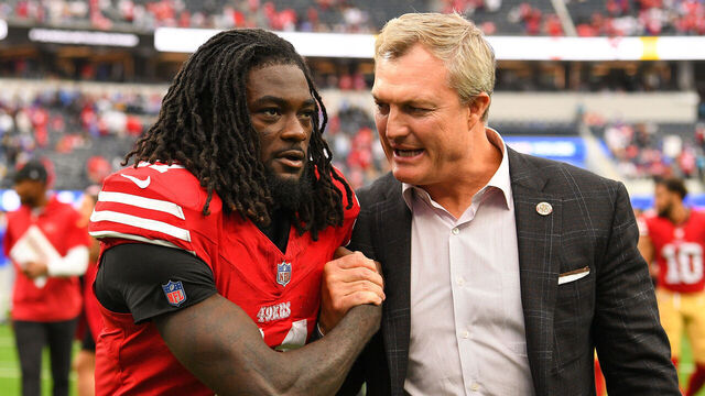 INGLEWOOD, CA - SEPTEMBER 17: San Francisco 49ers wide receiver Brandon Aiyuk (11) celebrates with general manager John Lynch after the NFL game between the San Francisco 49ers and the Los Angeles Rams on September 17, 2023, at SoFi Stadium in Inglewood, CA.