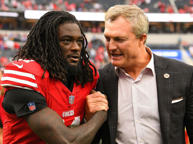 INGLEWOOD, CA - SEPTEMBER 17: San Francisco 49ers wide receiver Brandon Aiyuk (11) celebrates with general manager John Lynch after the NFL game between the San Francisco 49ers and the Los Angeles Rams on September 17, 2023, at SoFi Stadium in Inglewood, CA.