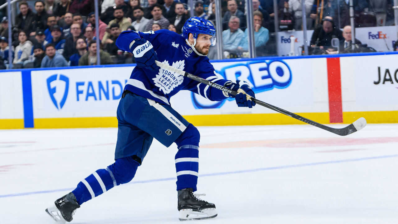 TORONTO, ON - JANUARY 19: Toronto Maple Leafs defenseman Oliver Ekman-Larsson (95) shoots the puck during the NHL regular season game between the Minnesota Wild and the Toronto Maple Leafs on January 19, 2026, at Scotiabank Arena in Toronto, ON, Canada.