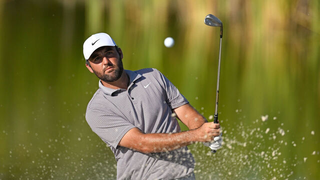 NASSAU, BAHAMAS - DECEMBER 07: Scottie Scheffler plays a shot from the bunker on the 12th hole during the final round of the Hero World Challenge at Albany Golf Course on December 7, 2025 in Naussau, New Providence.